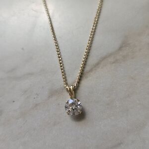 Elegant Gold Necklace with Clear Pendant